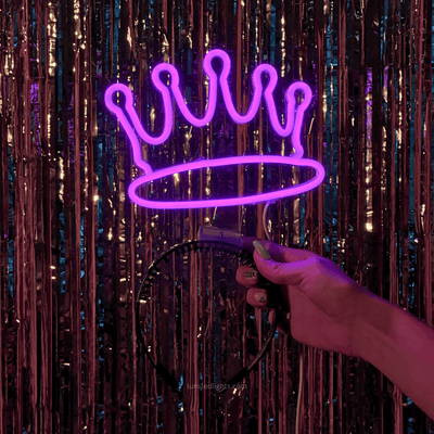Crown LED headband neon accessory held in hand