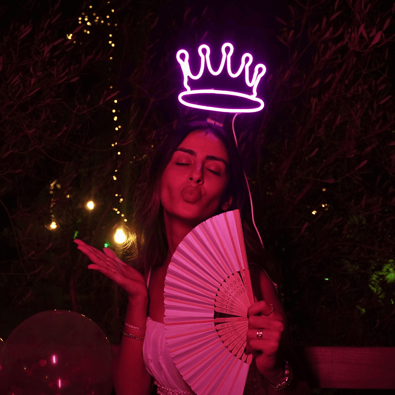 Crown LED headband neon accessory held in hand