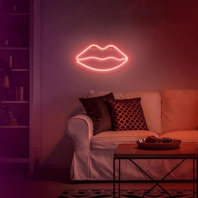 Red lip neon sign close-up glowing