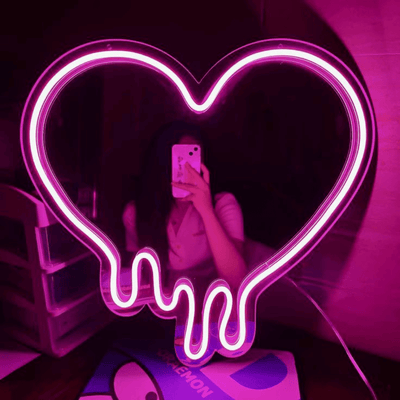 Drippy heart LED neon sign glowing pink