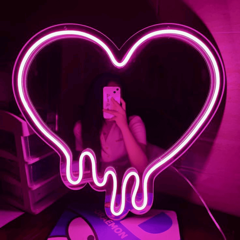 Drippy heart LED neon sign glowing pink