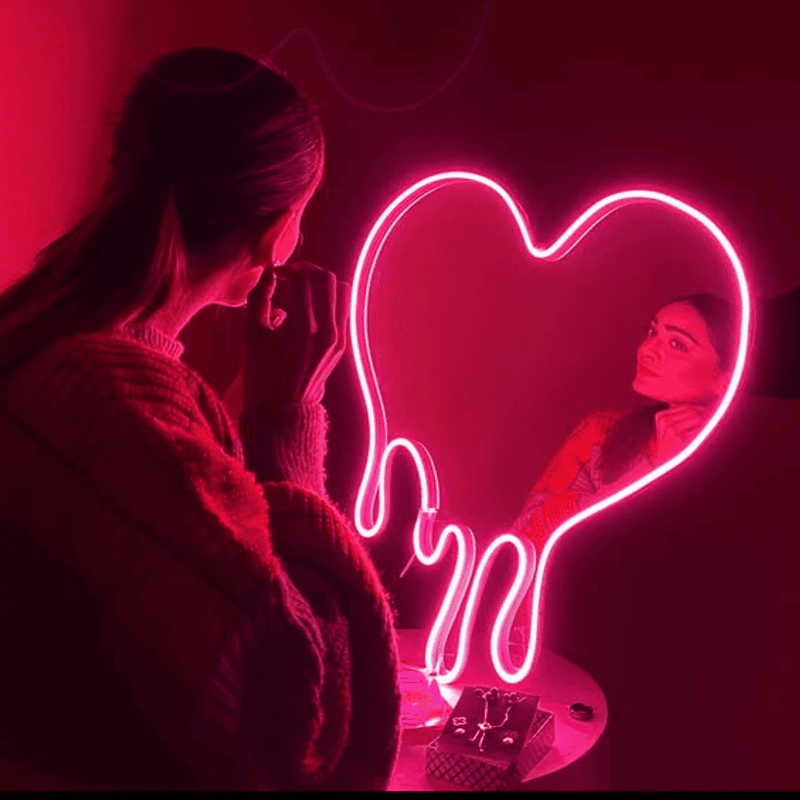 Drippy heart LED neon sign glowing pink