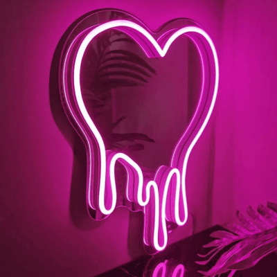 Drippy heart LED neon sign glowing pink