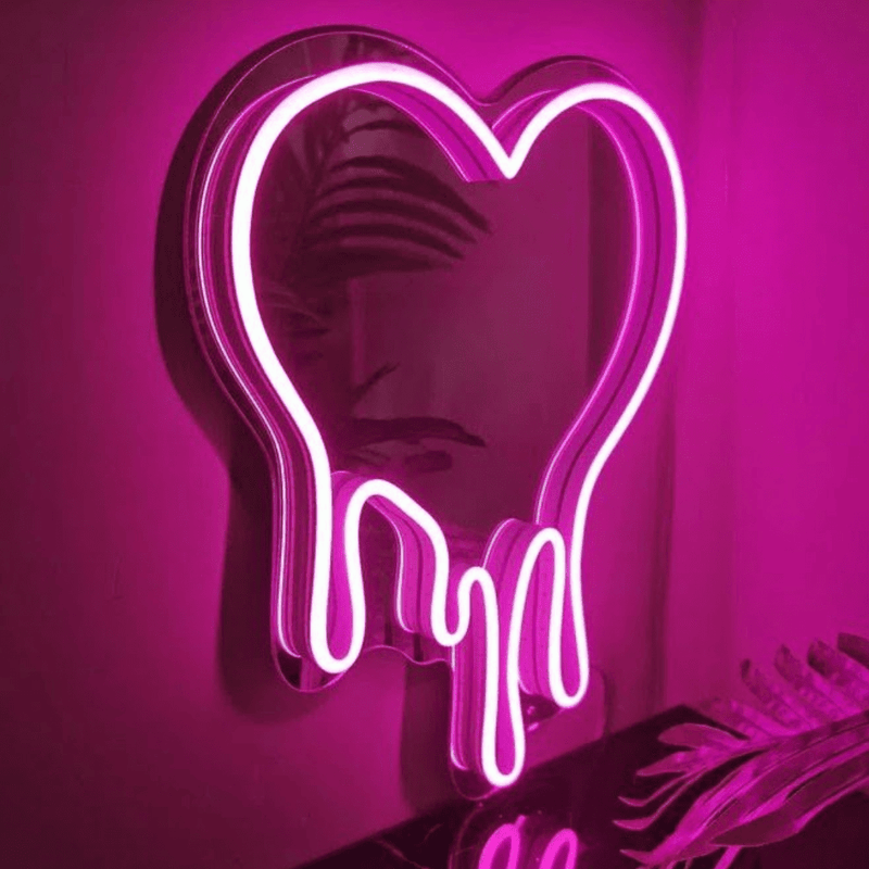 Drippy heart LED neon sign glowing pink