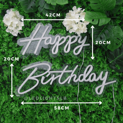 Happy Birthday LED neon sign on greenery wall