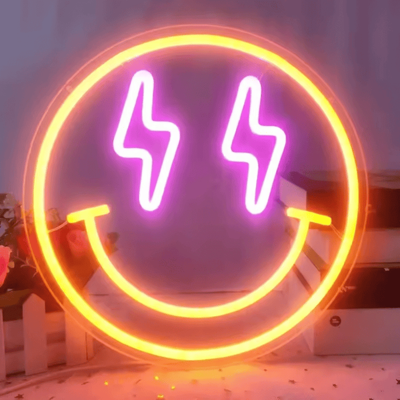 Smiley LED neon sign with yellow and purple lights